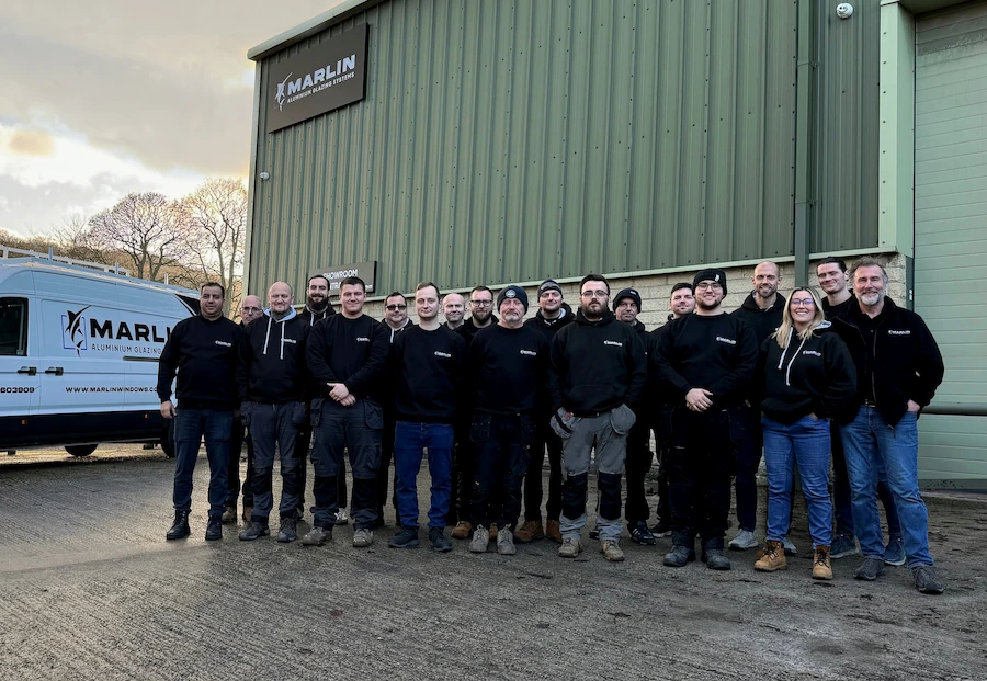 the Marlin Windows team standing in front of the warehouse
